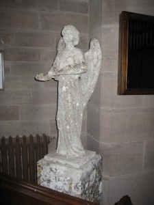 Eastnor-Herefordshire - St. John the Baptist. - stone angel